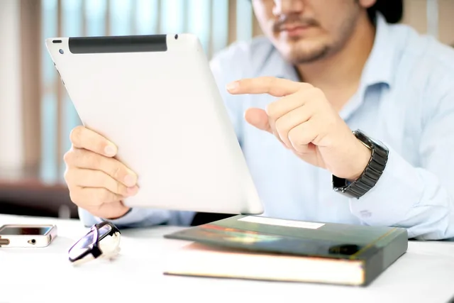 hand, white hand, tab in hand. Reviewing an attribution claim by evidence level, from supplier record to buyer test